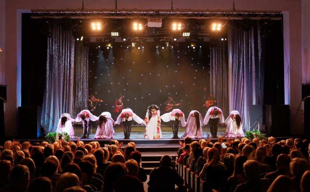 A stage of actors taking a bow at Mountain Theatre Company in North Carolina